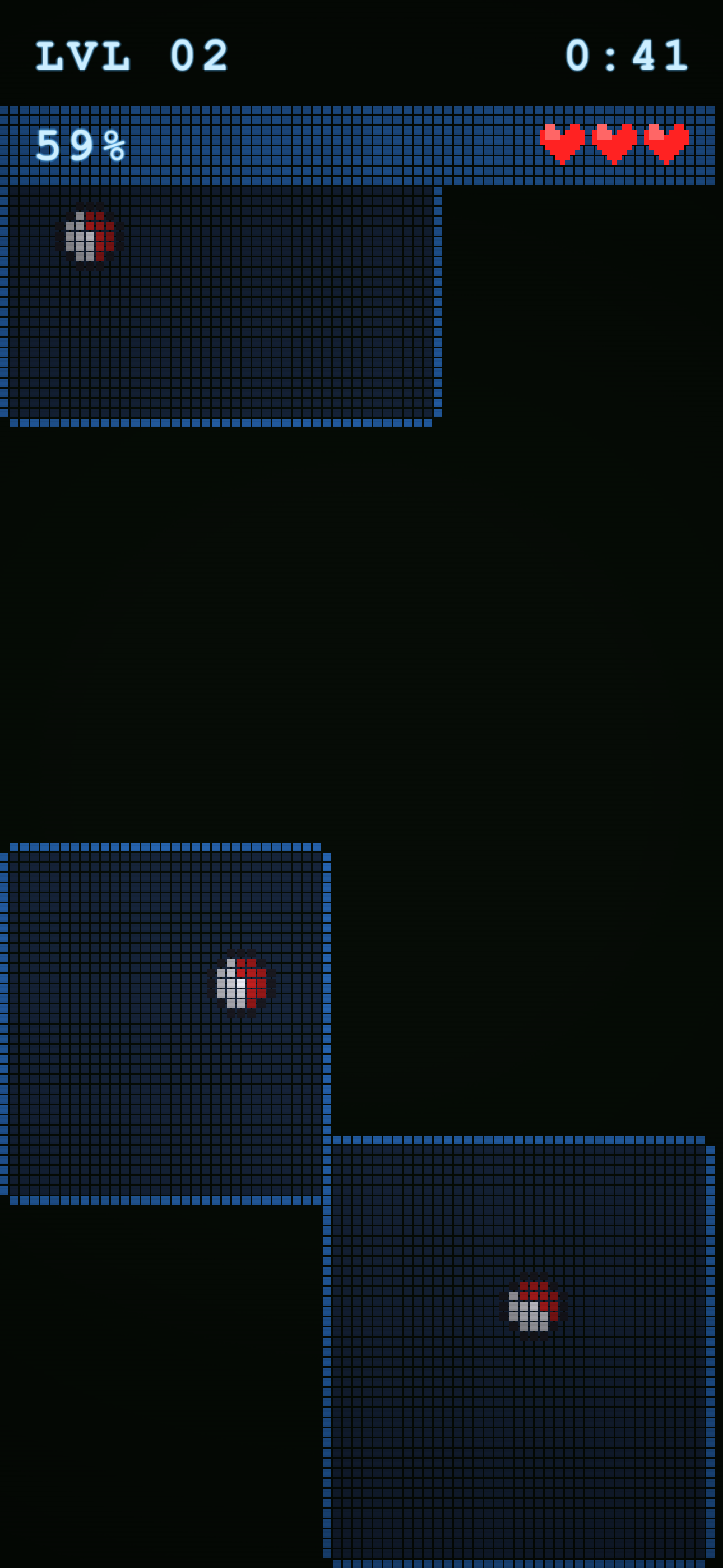 Mid-gameplay on Level 2 with walls built around bouncing balls