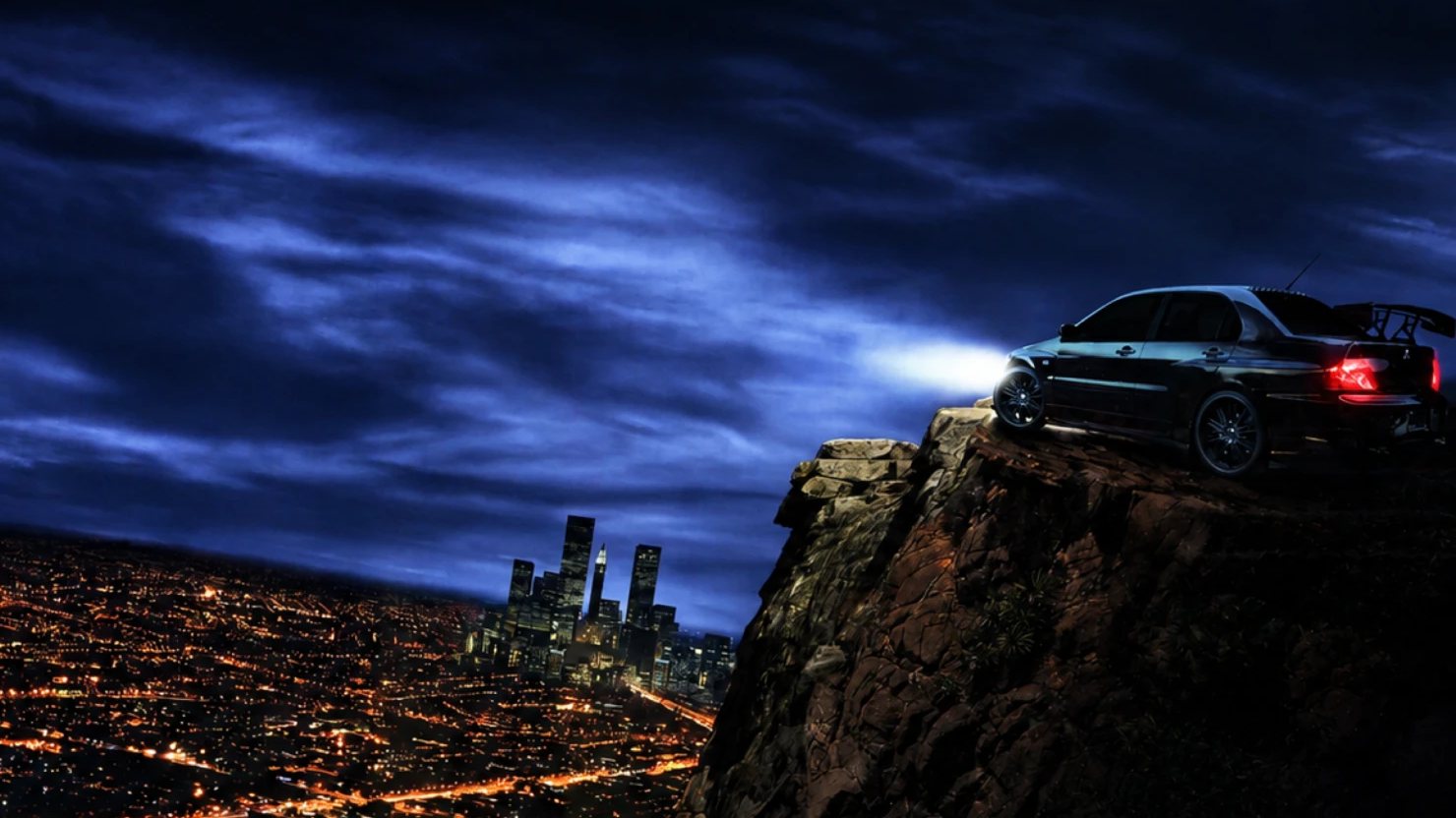 Need for Speed: Carbon key art: a black sports car at the edge of a cliff at night, headlights on, above the lights of a city