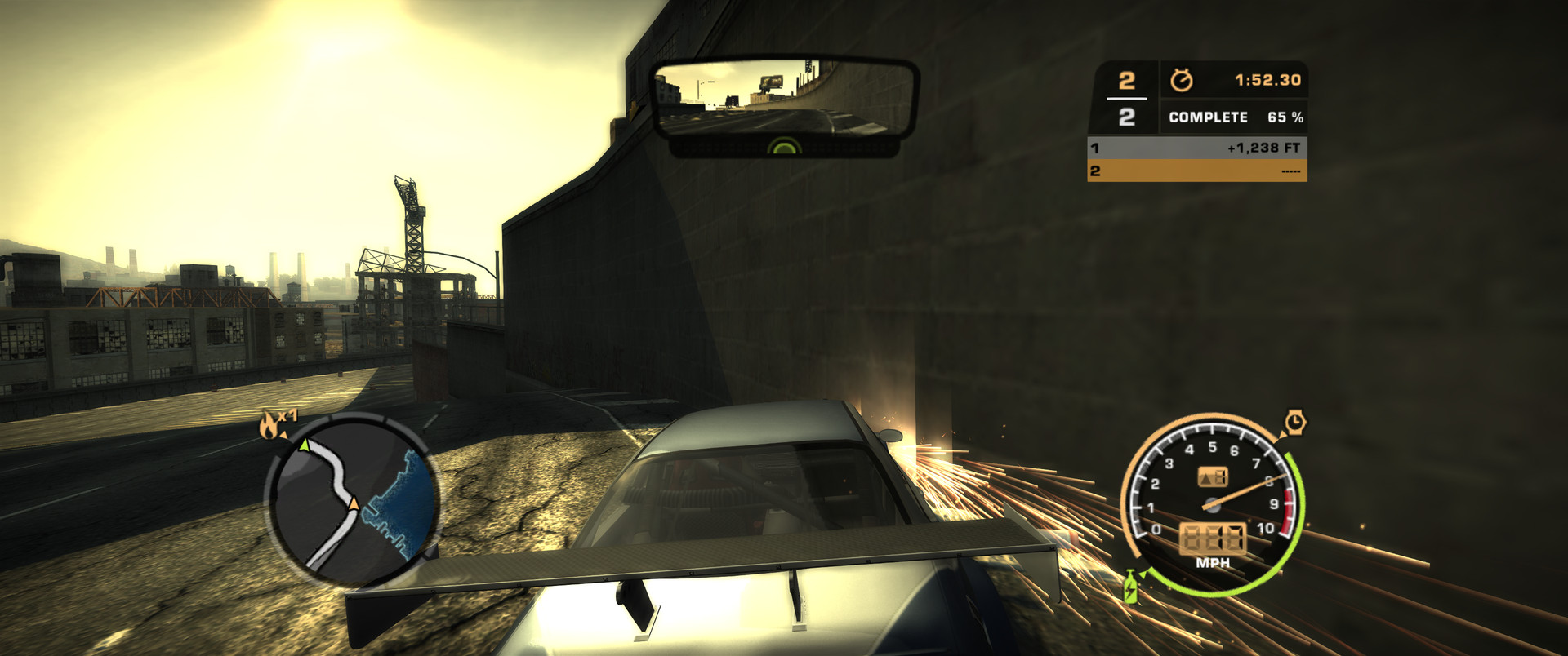 Sun glare, 21:9: a car sliding along a wall toward a low sun, throwing sparks, with the race HUD