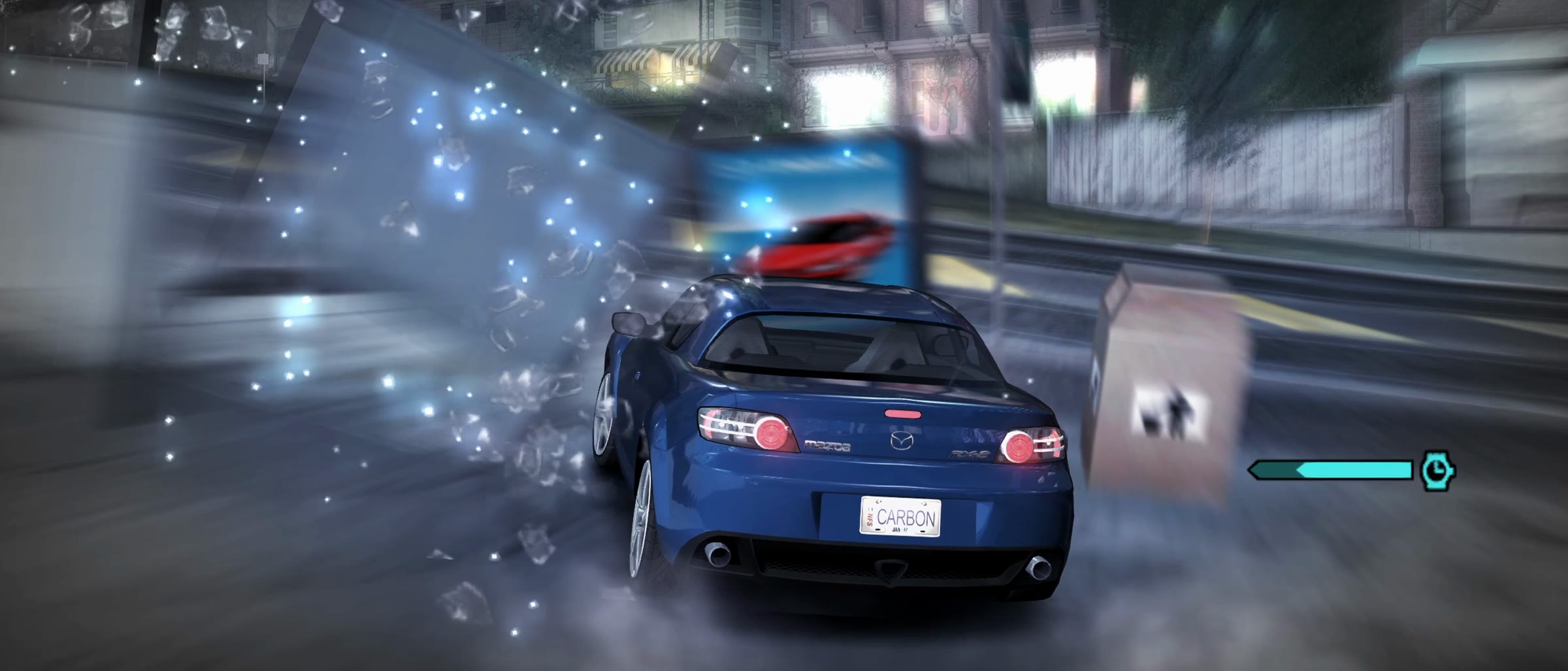 SpeedBreaker: Carbon gameplay in the game's Speedbreaker slow motion: the player's blue car smashing through a bus shelter's glass on a Palmont street at night
